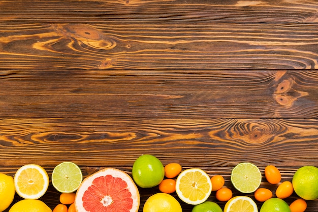 Fruit frame on wooden background