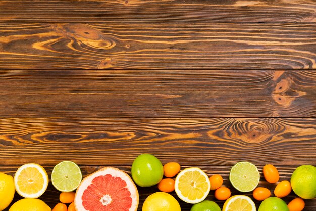 Fruit frame on wooden background