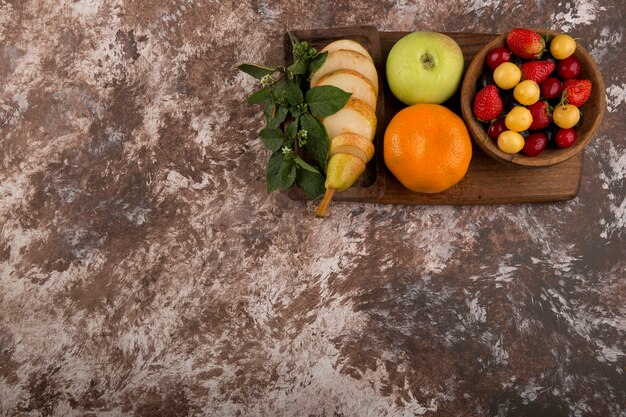 Fruit platter with mint on the marble