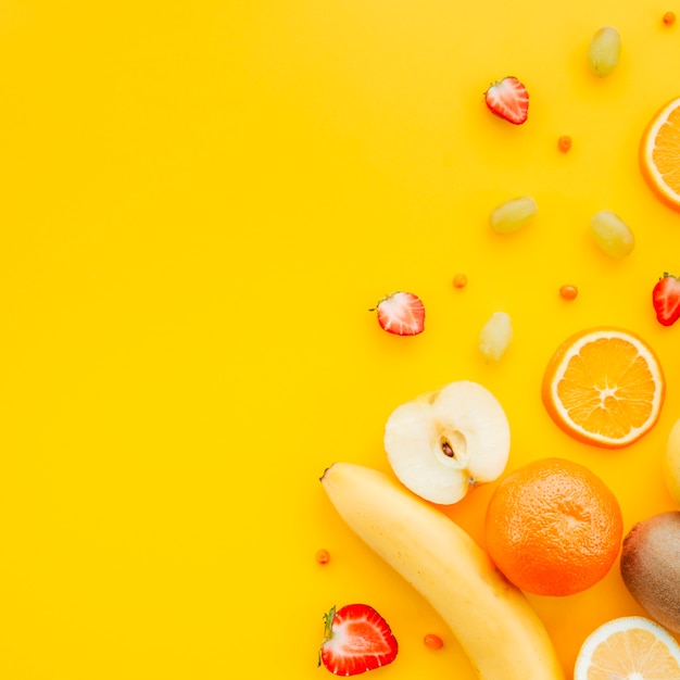 Fruit platter on yellow background
