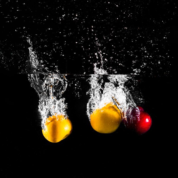 Fruit plunging into the water