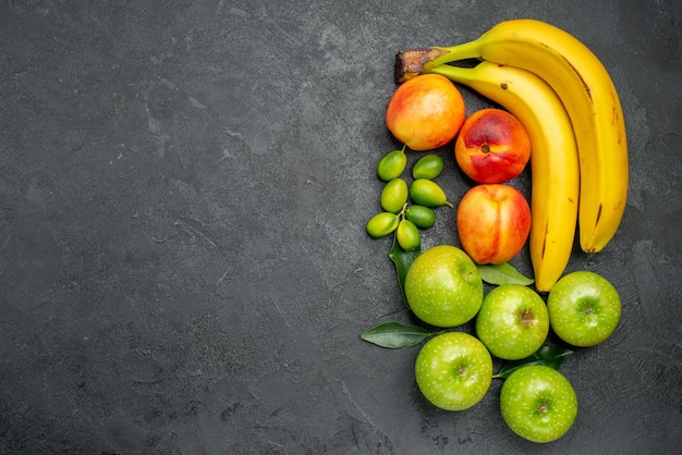 fruits citrus fruits green apples with leaves nectarines and bananas