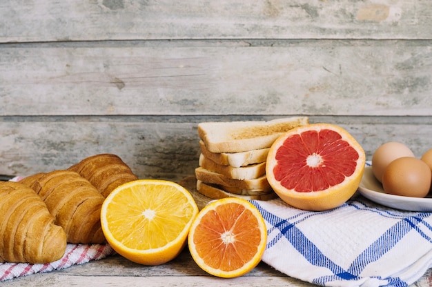 Fruits and pastry on table