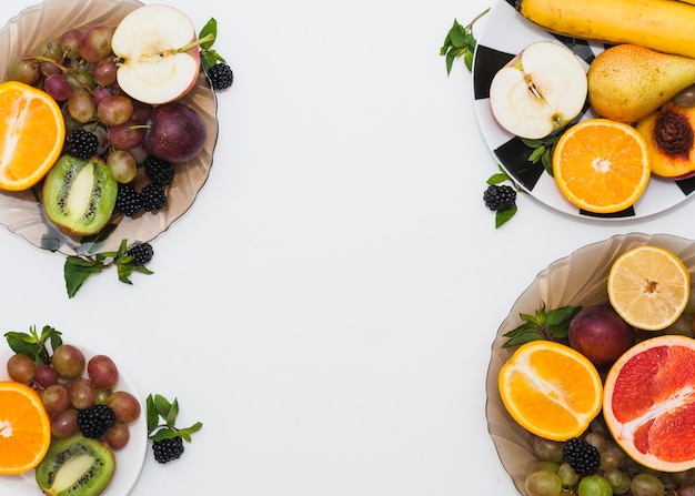 Fruits plates on white background