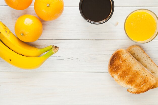 Fruits, toasts and coffee