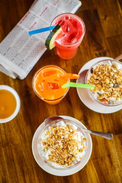 Fruits with muesli fresh juice and espresso