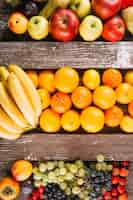 Free photo fruits on wooden surface