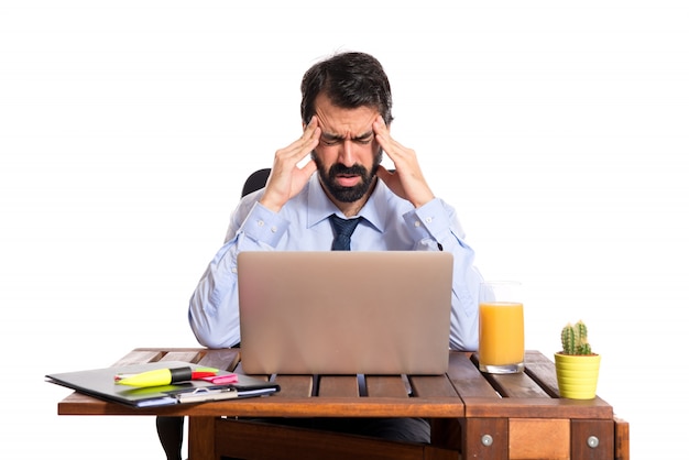 frustrated businessman over white background