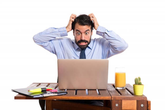 frustrated businessman over white background