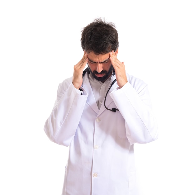 Frustrated doctor over isolated white background