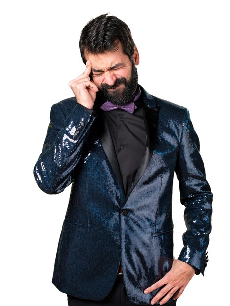 Frustrated handsome man with sequin jacket