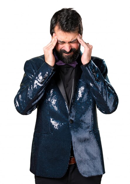 Frustrated handsome man with sequin jacket