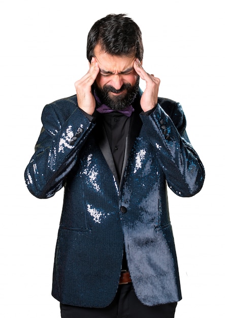 Frustrated handsome man with sequin jacket