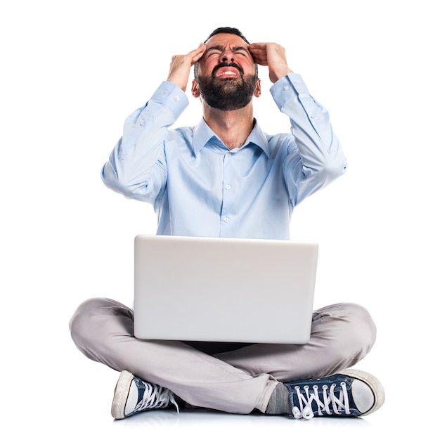 Free photo frustrated man with laptop