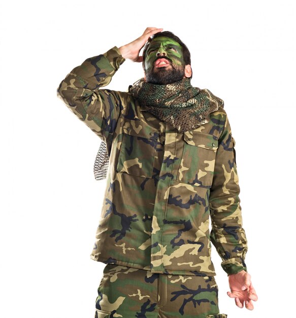 frustrated soldier over white background