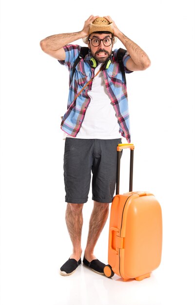 frustrated tourist over white background