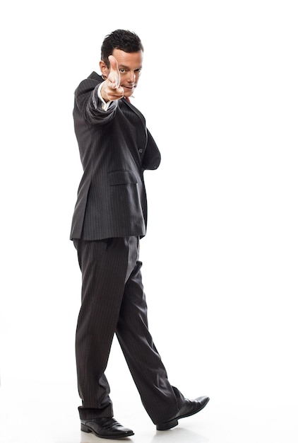 Full body picture of handsome business man in a suit isolated on white background.