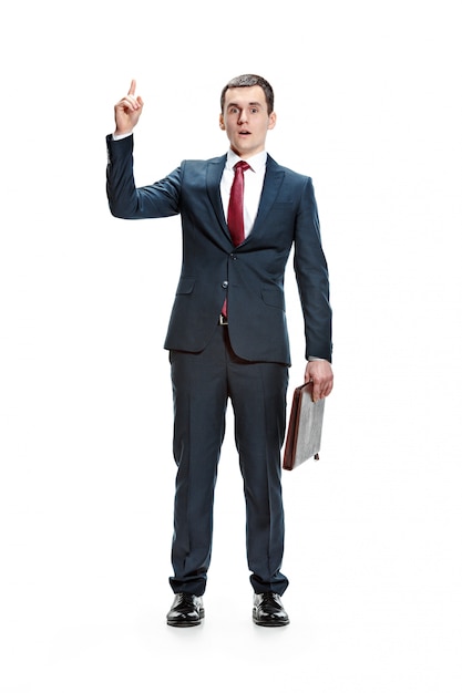 Full body portrait of businessman with folder on white