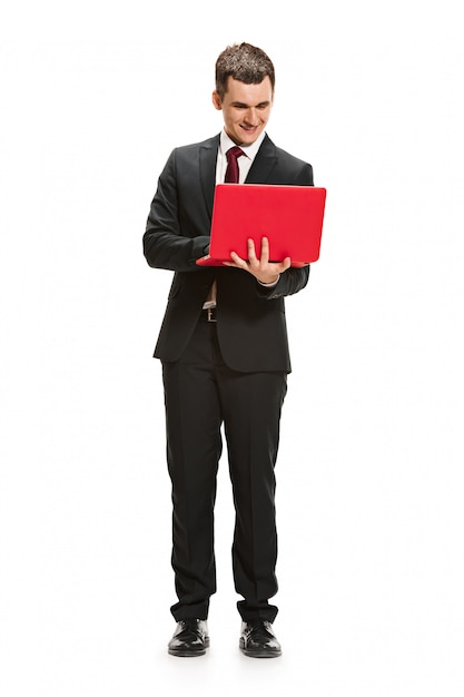 Free photo full body portrait of businessman with laptop on white