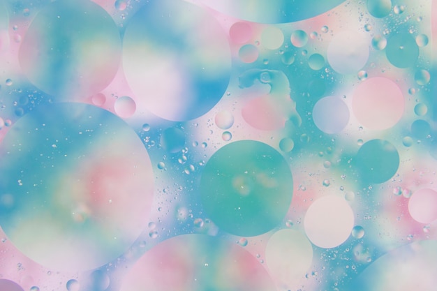 Free photo full frame of blue and pink bubbles background