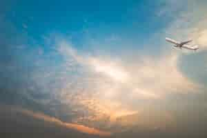 Free photo full frame shot of  cloudscape with a plane flying over