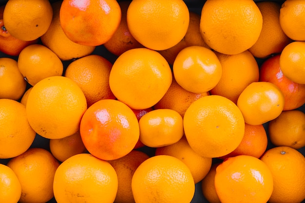 Full frame of whole oranges