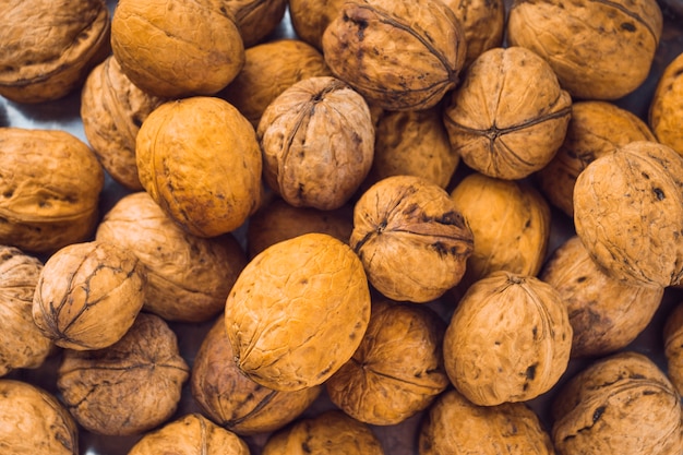 Full frame of whole walnuts