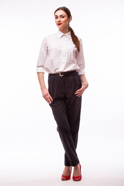 Full height portrait Young pretty businesswoman on white.