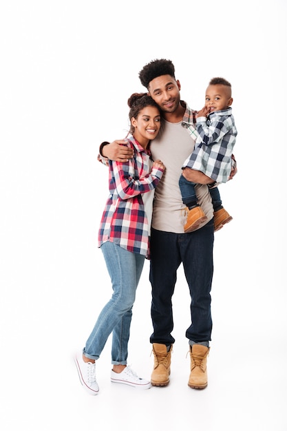 Full length portrait of a cheerful young african family