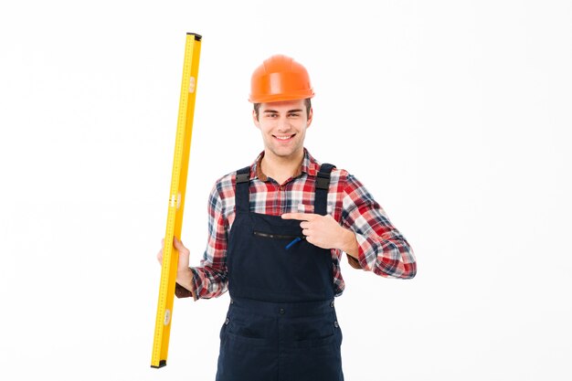 Full length portrait of a cheery young male builder