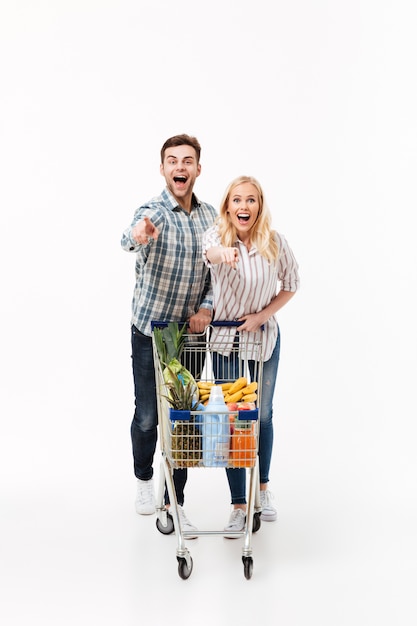 Full length portrait of a joyful couple