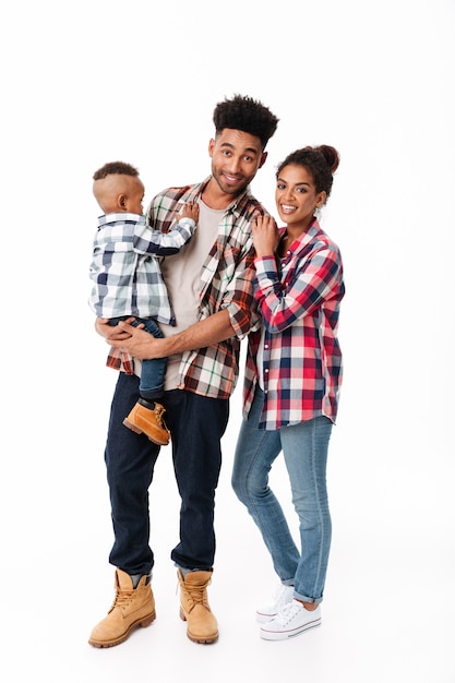 Free photo full length portrait of a loving young african family