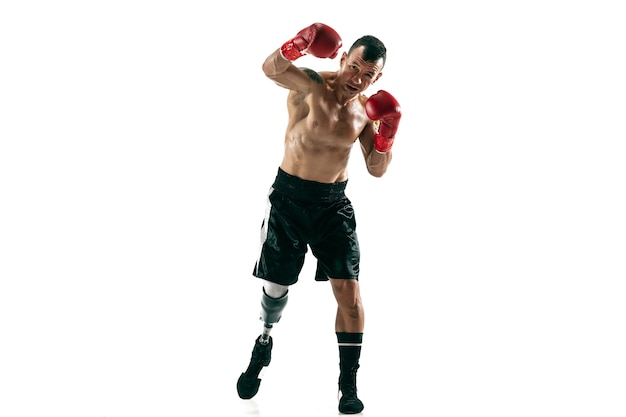 Free photo full length portrait of muscular sportsman with prosthetic leg