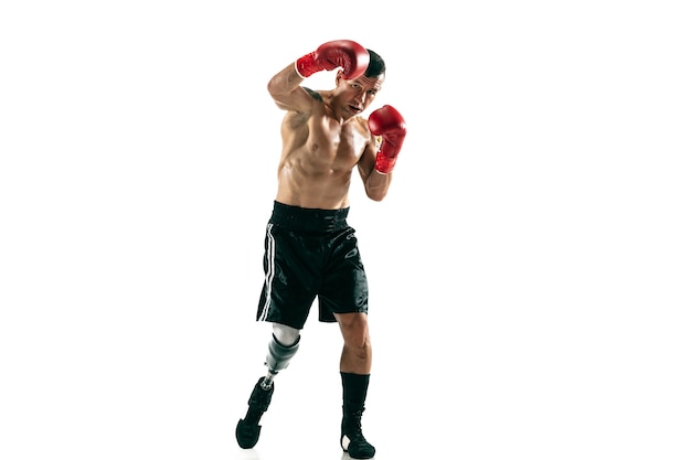 Full length portrait of muscular sportsman with prosthetic leg