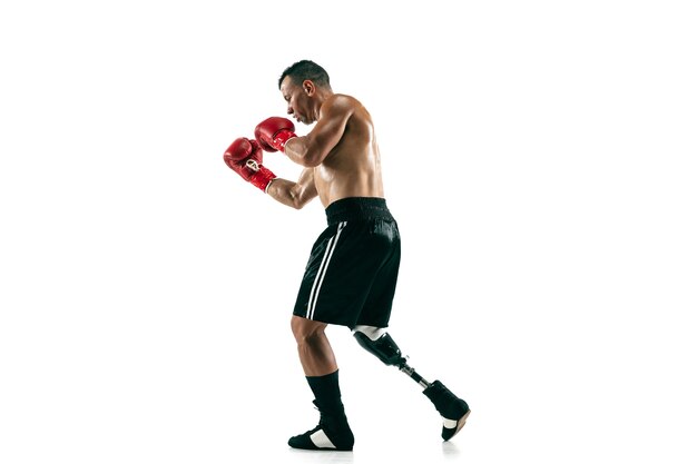 Full length portrait of muscular sportsman with prosthetic leg