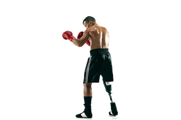 Full length portrait of muscular sportsman with prosthetic leg