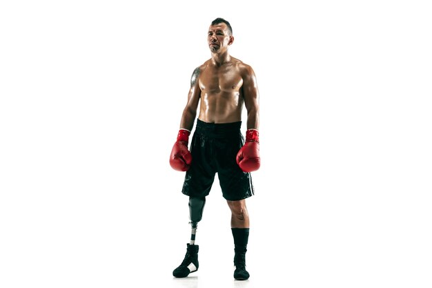 Full length portrait of muscular sportsman with prosthetic leg