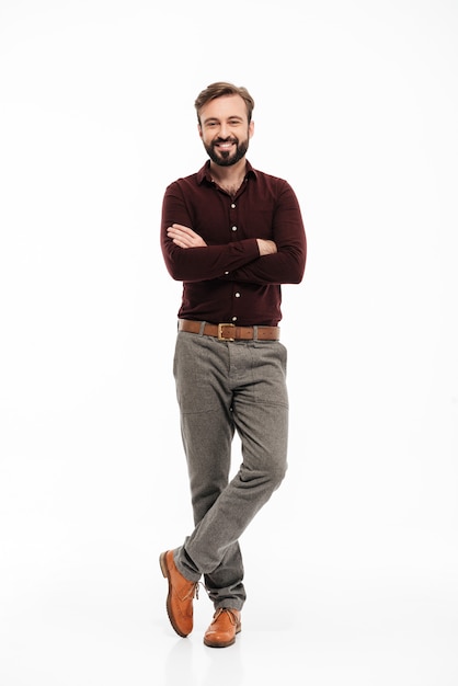Full length portrait of a relaxed smiling man