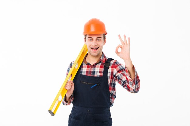 Full length portrait of a successful young male builder