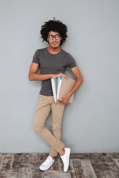 Full length portrait of a young afro american man