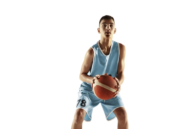 Full length portrait of young basketball player with a ball isolated on white  space