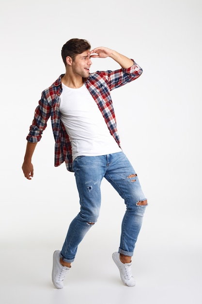 Free photo full length portrait of a young casual man