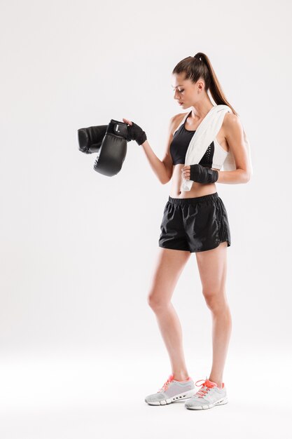 Full length portrait of a young healthy sportswoman