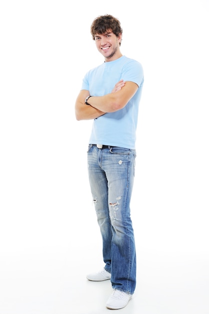 Free photo full-length portrait of young muscular smiling handsome man