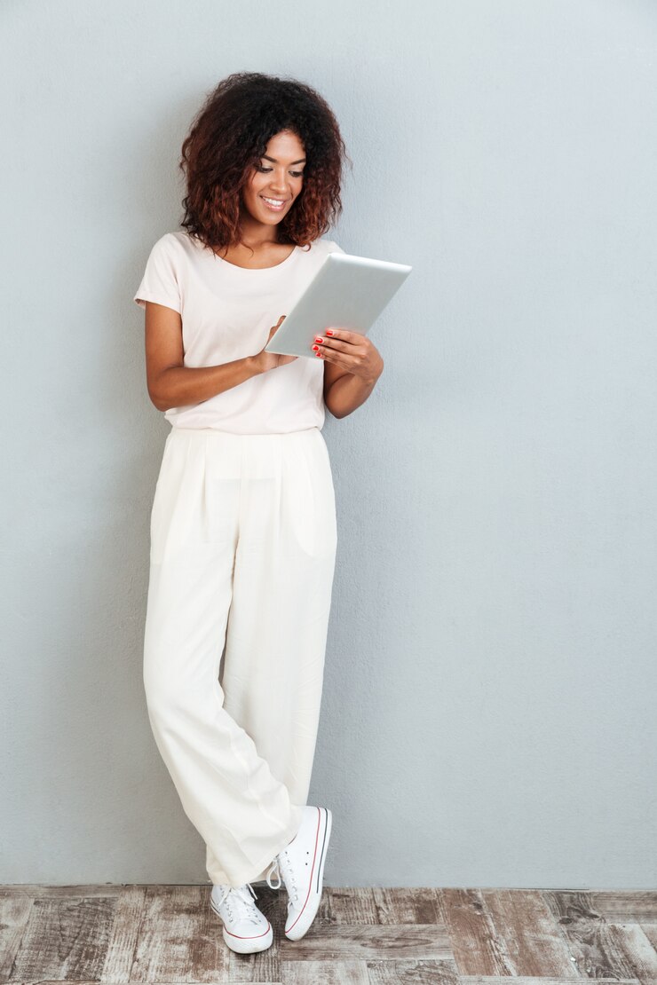 Free Photo full length of a pretty young afro american woman