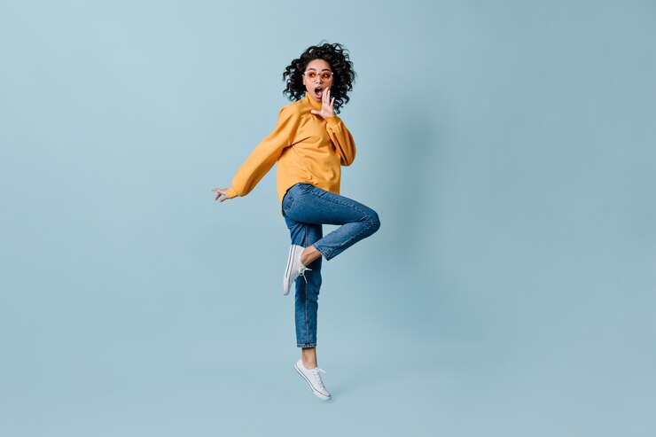 Free Photo full length view of shocked woman in trendy clothes