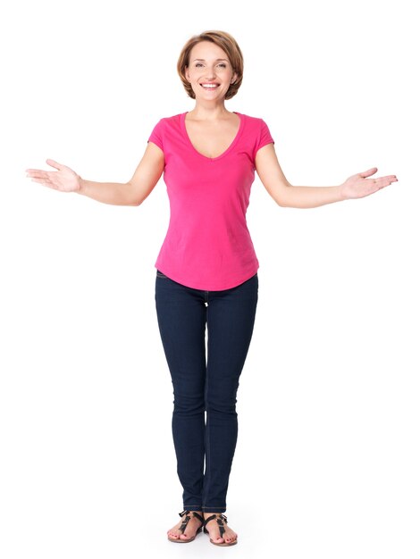 Full portrait of adult happy woman with presentation gesture on white