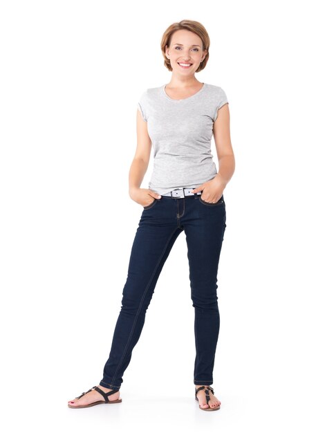 Full portrait of the beautiful happy woman stands on white