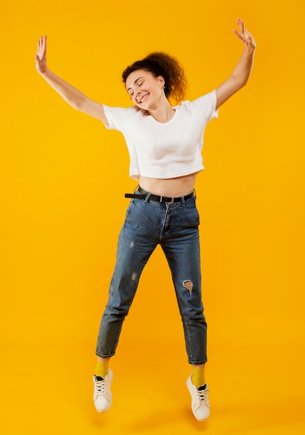 Full shot of beautiful happy woman