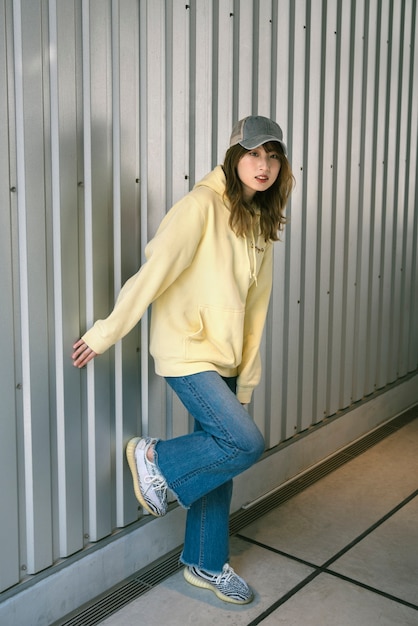 Full shot beautiful woman with trucker hat